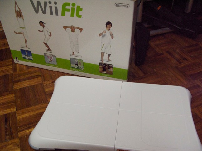 This photo shows the Wii Fit box and balance board