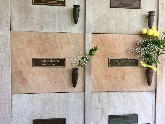 Hugh Hefner and Marilyn Monroe's mausoleum burial chambers adorned with flowers